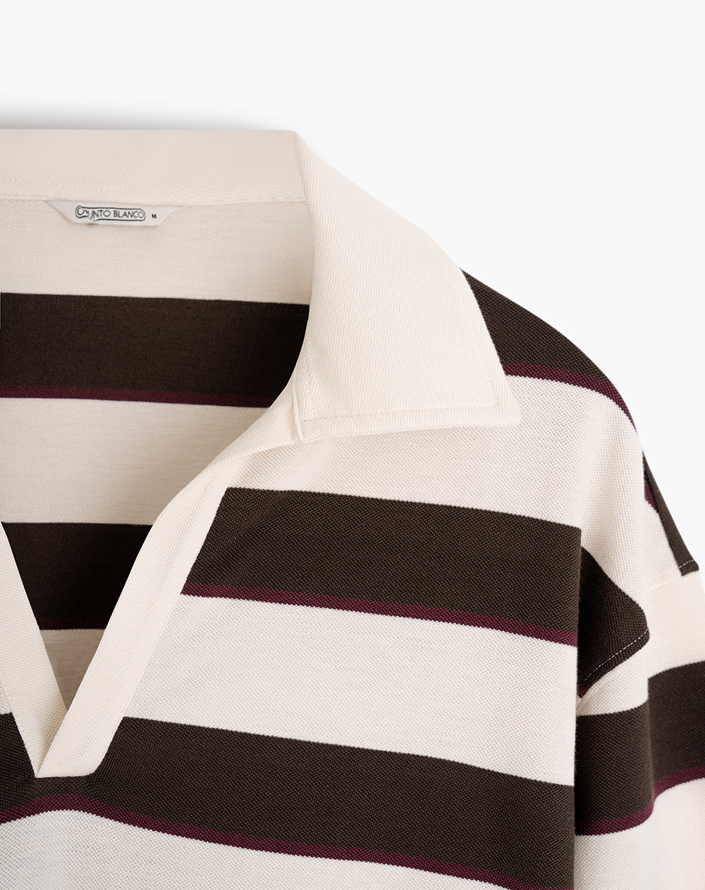 Buzo relaxed fit cafe rayas