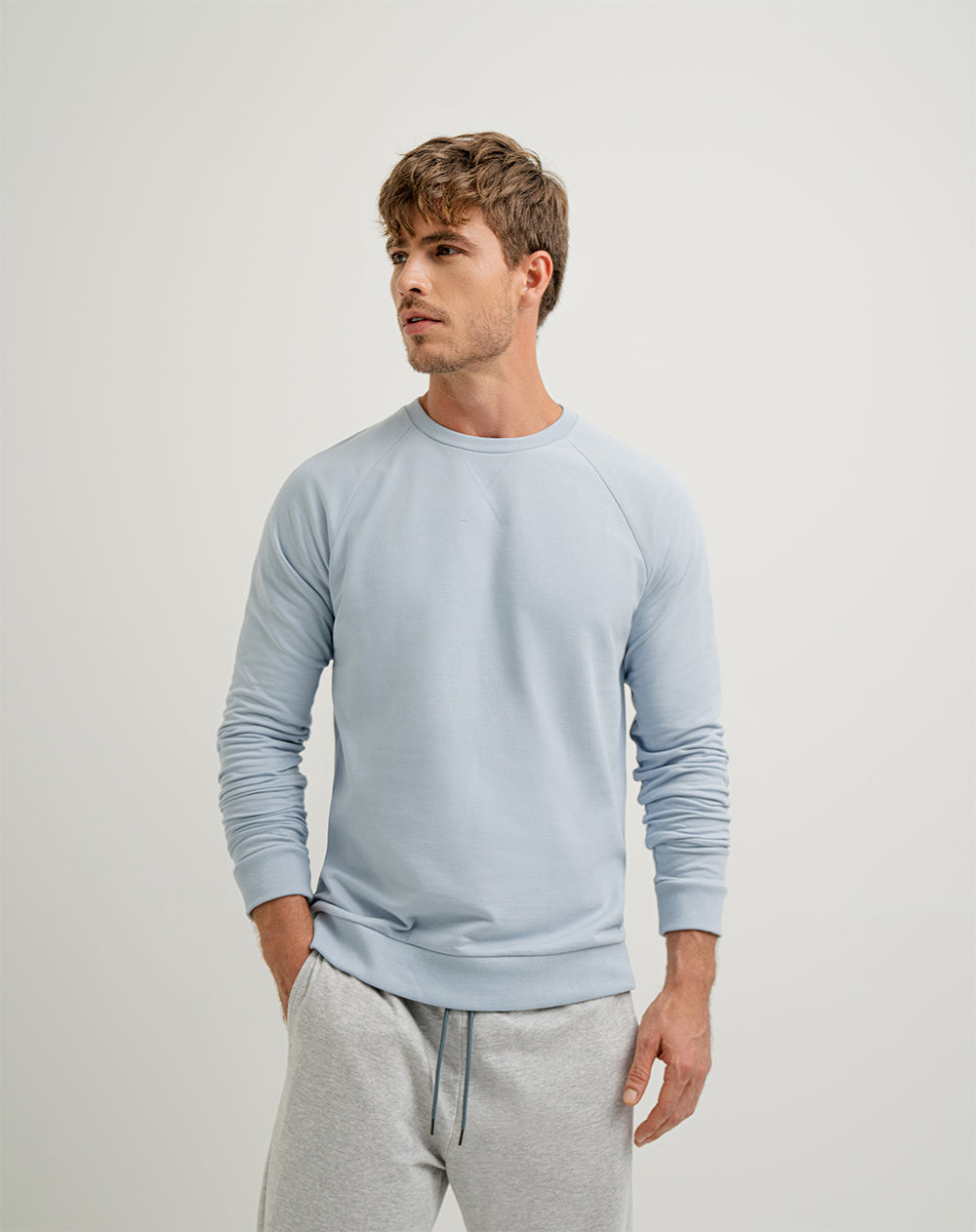 Buzo en algodón sostenible azul claro para hombre
