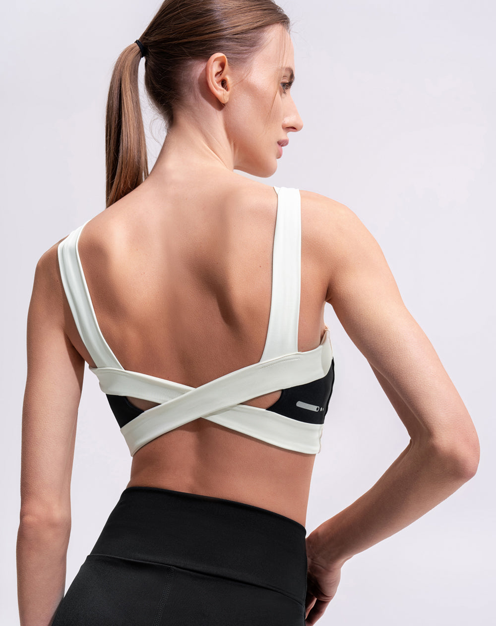 Top deportivo soporte medio bloques mujer