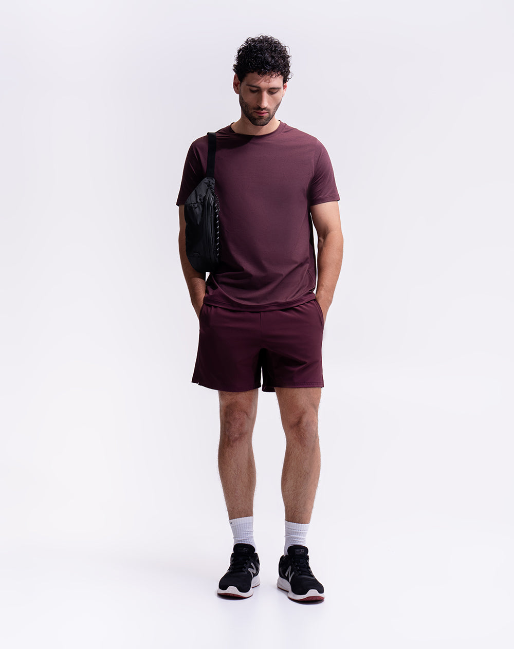 Camiseta deportiva control humedad vino tinto hombre