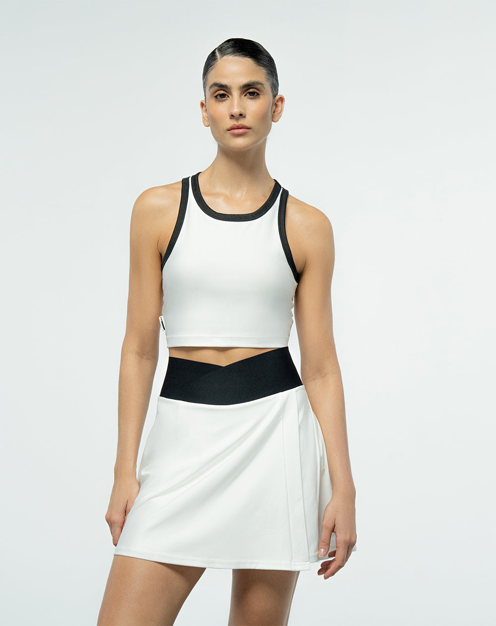 Top deportivo soporte bajo control de humedad blanco