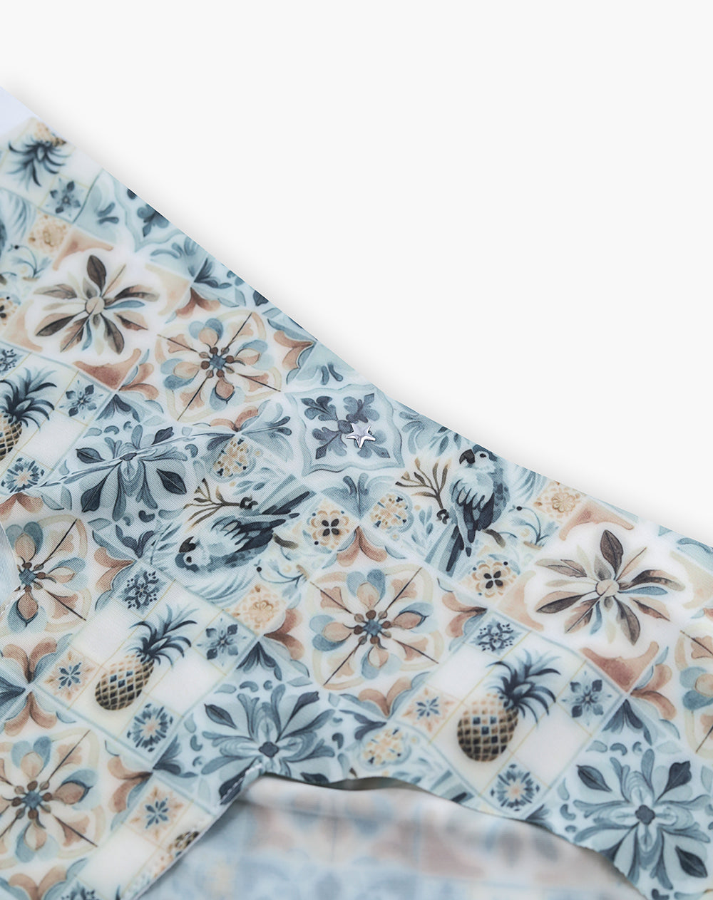 Panty cachetero en punto tiro medio habano estampado