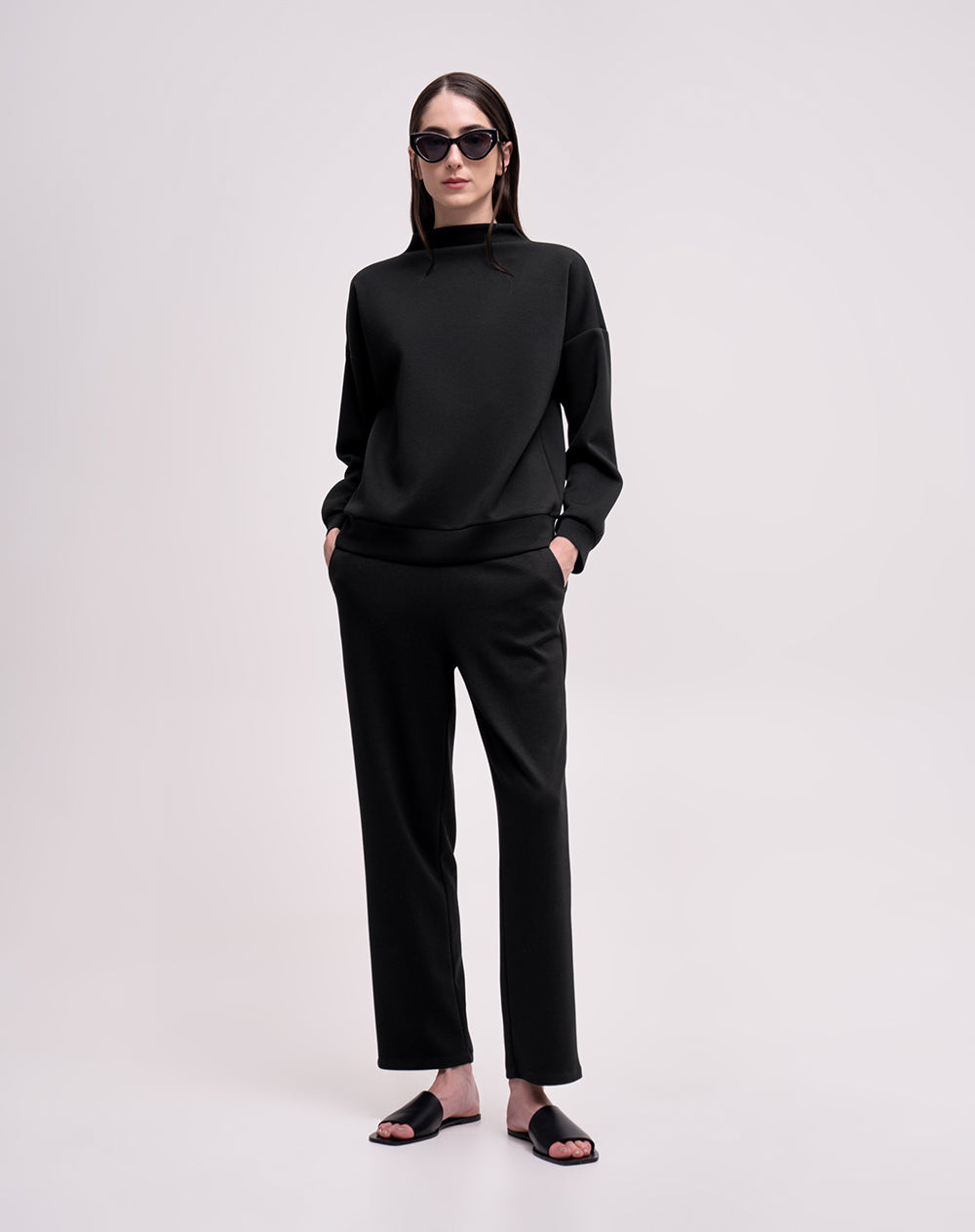 Buzo confort cuello alto tacto suave negro mujer