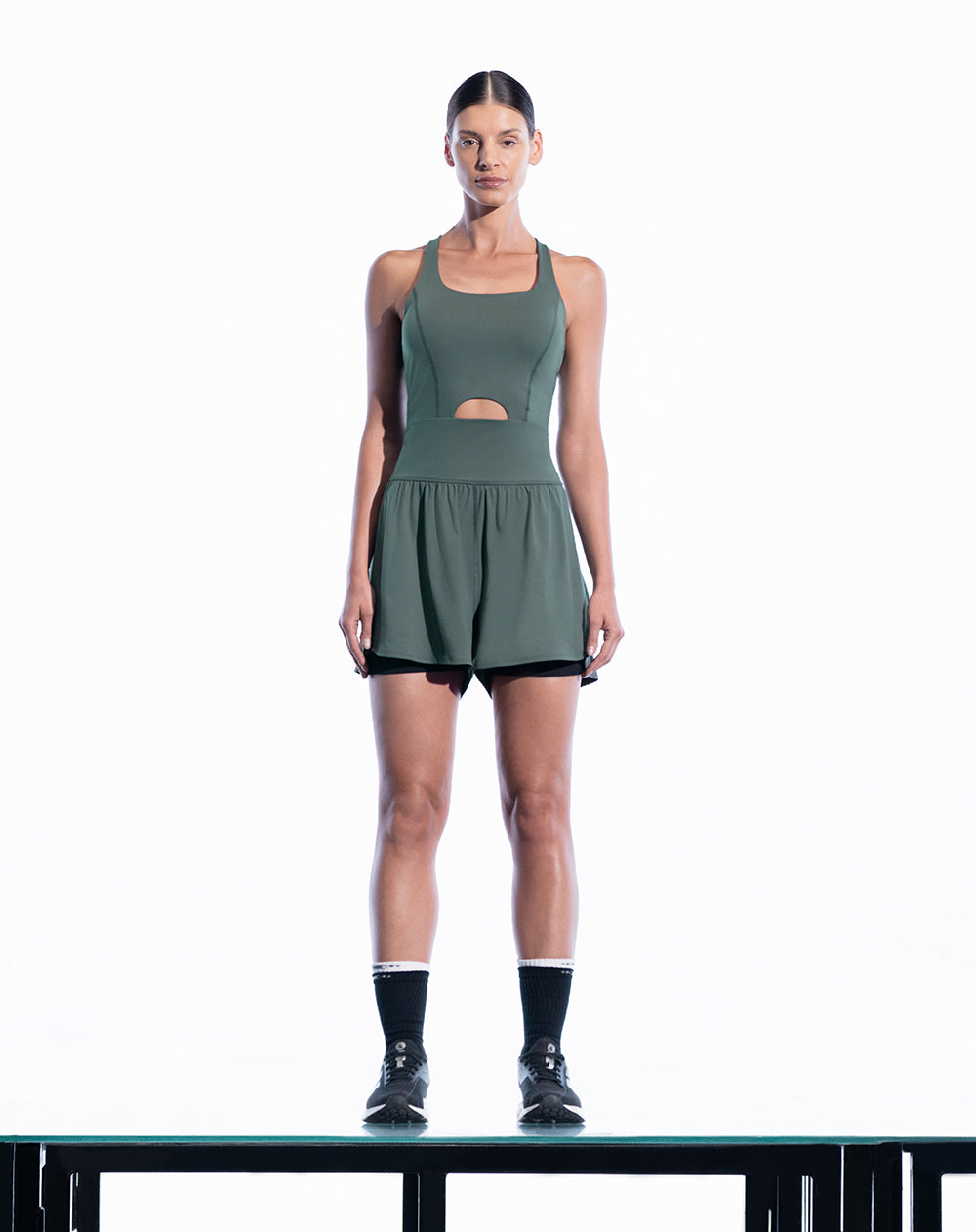 Enterizo deportivo control humedad verde para mujer