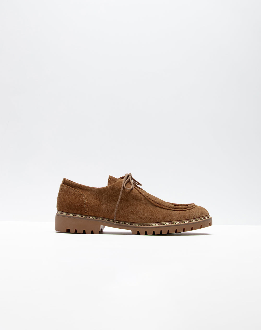 Zapatos en cuero cafés