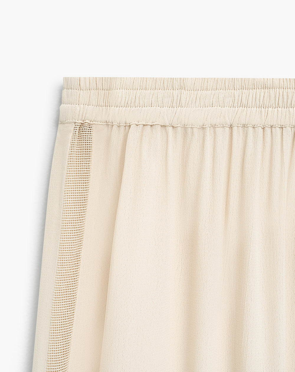 Pantalón tiro medio beige mujer