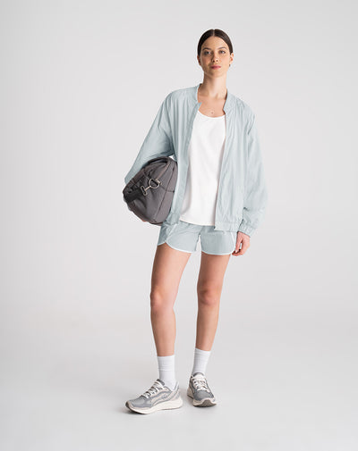 Chaqueta rompevientos oversize gris mujer