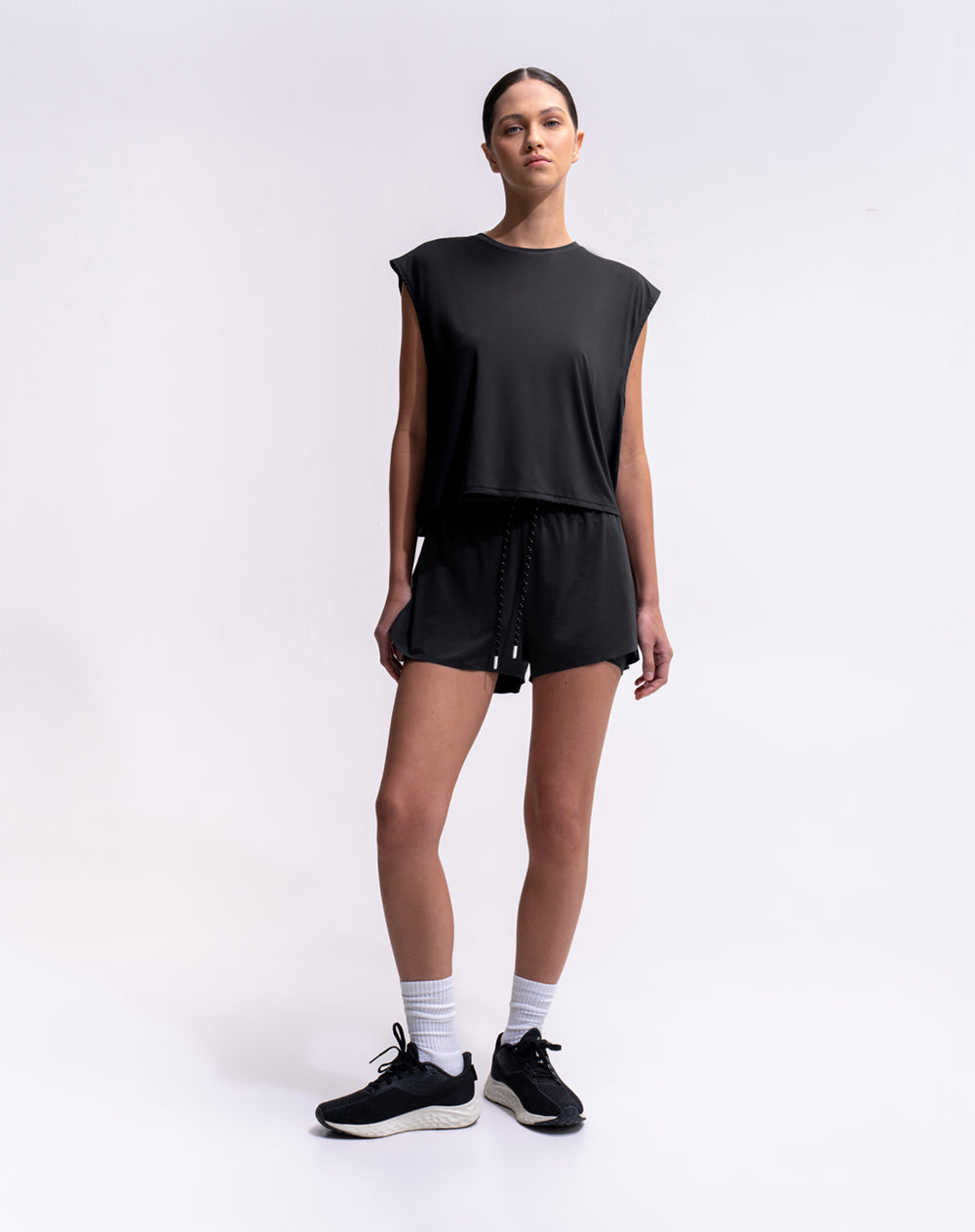 Camiseta deportiva regular negra mujer