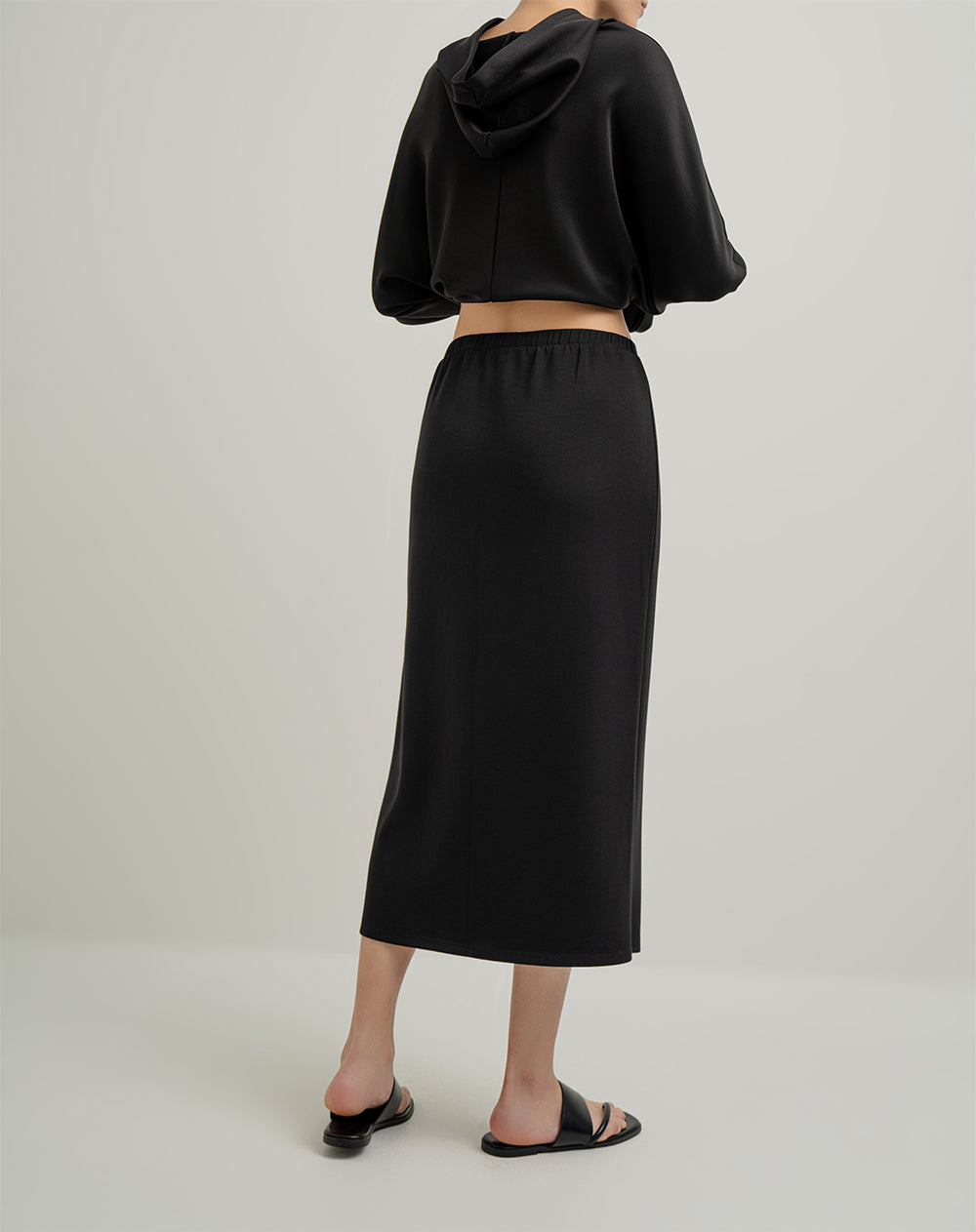 Falda midi tiro alto negro para mujer