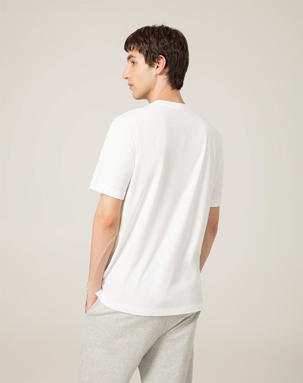 Camiseta algodón sostenible botones en cuello blanca para hombre