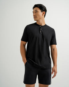 Camiseta algodón sostenible botones en cuello negra para hombre