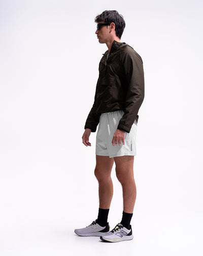 Pantaloneta deportiva secado rápido gris hombre