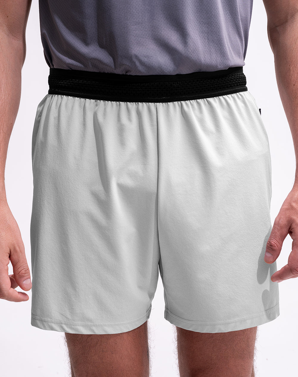 Pantaloneta deportiva secado rápido gris hombre