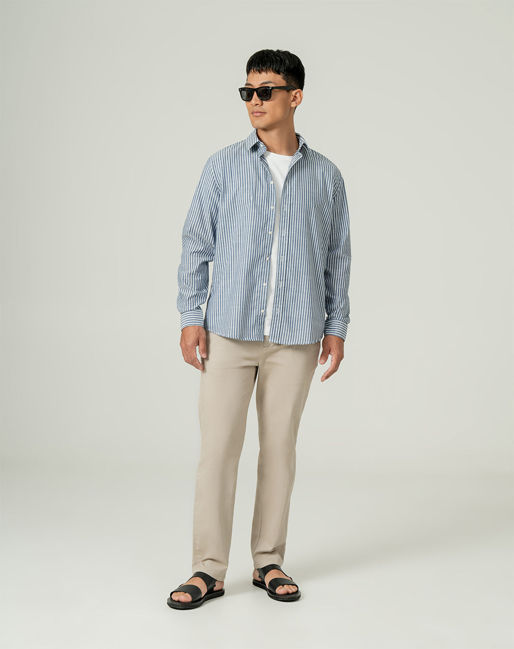 Camisa regular fit manga larga azul con rayas