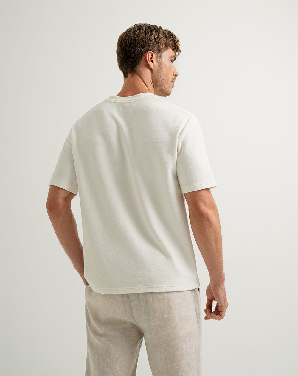 Camiseta oversized fit en tela con textura manga corta habana