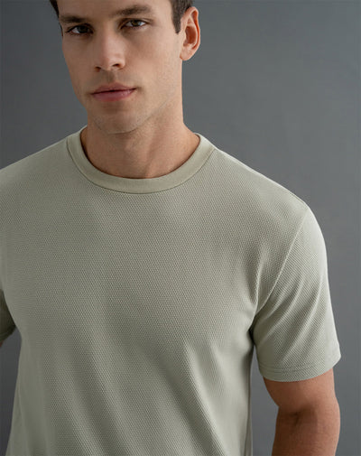 Camiseta oversized fit en tela con textura manga corta verde