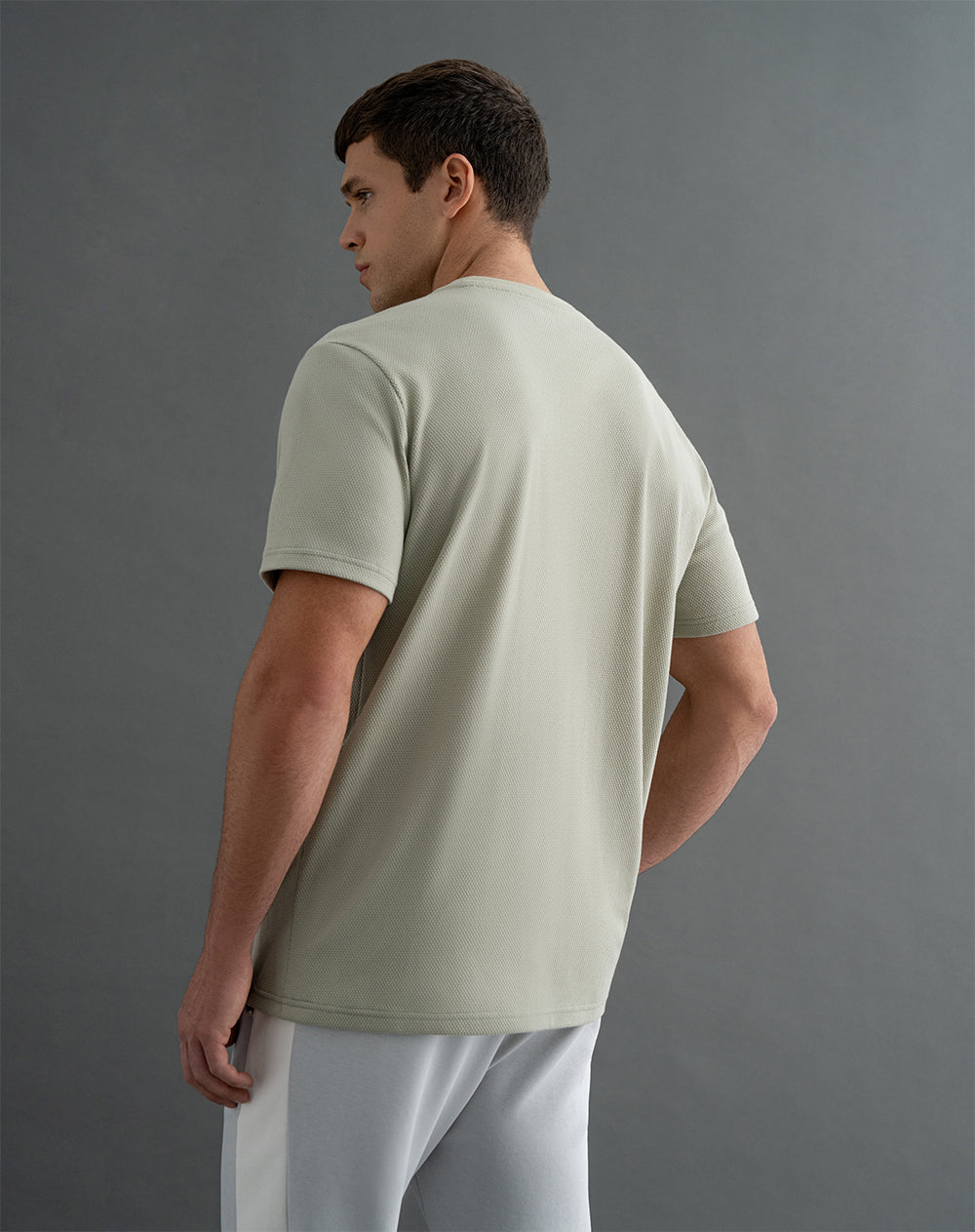 Camiseta oversized fit en tela con textura manga corta verde