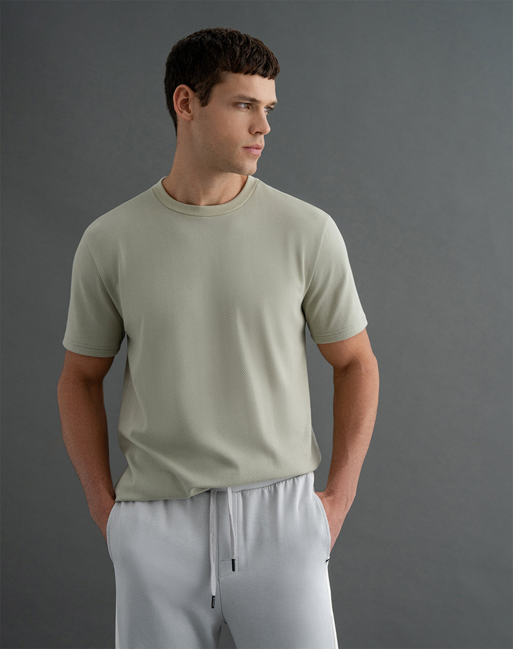 Camiseta oversized fit en tela con textura manga corta verde