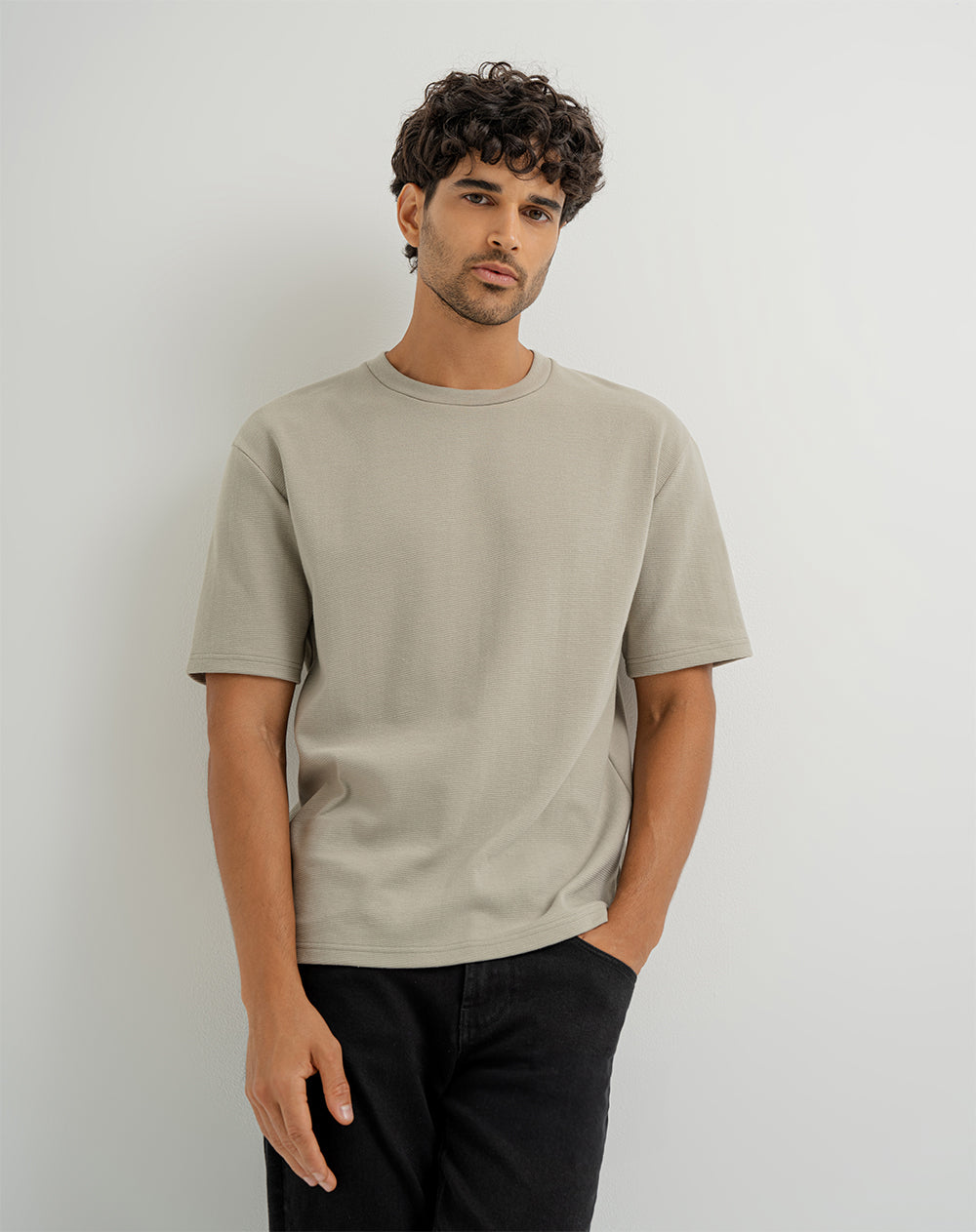 Camiseta oversized fit en tela con textura manga corta verde