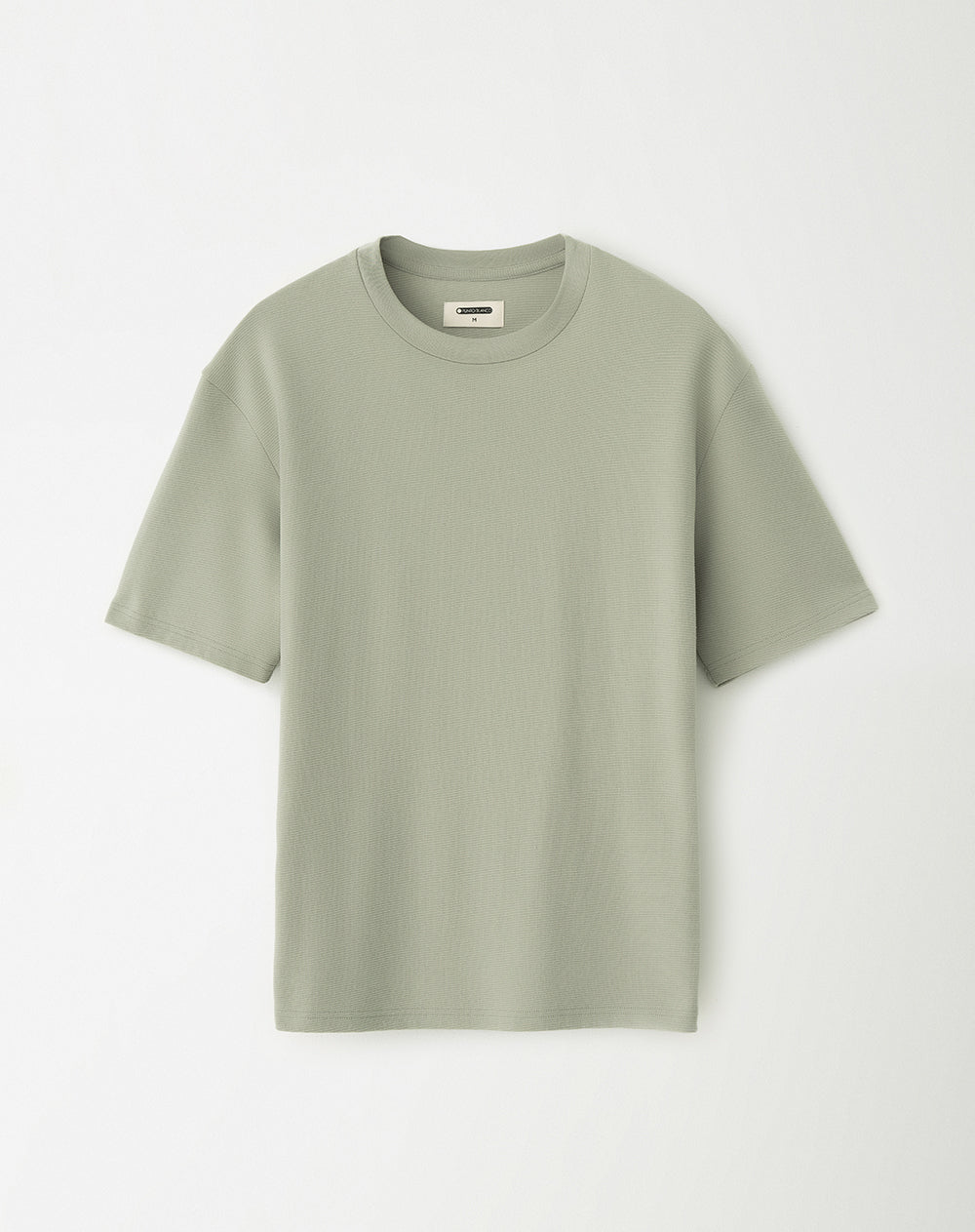 Camiseta oversized fit en tela con textura manga corta verde