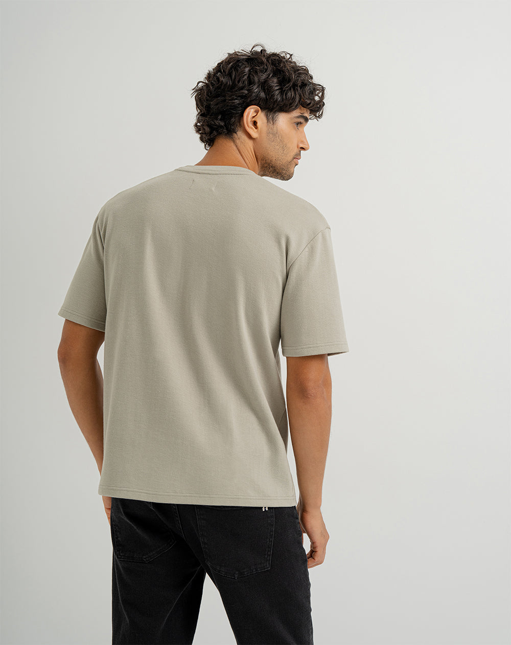 Camiseta oversized fit en tela con textura manga corta verde