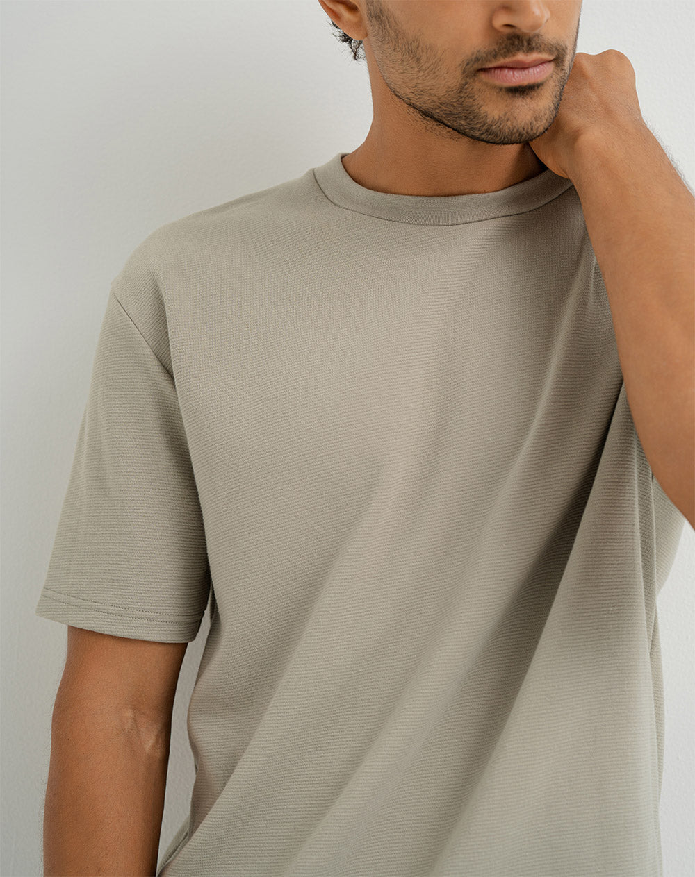 Camiseta oversized fit en tela con textura manga corta verde