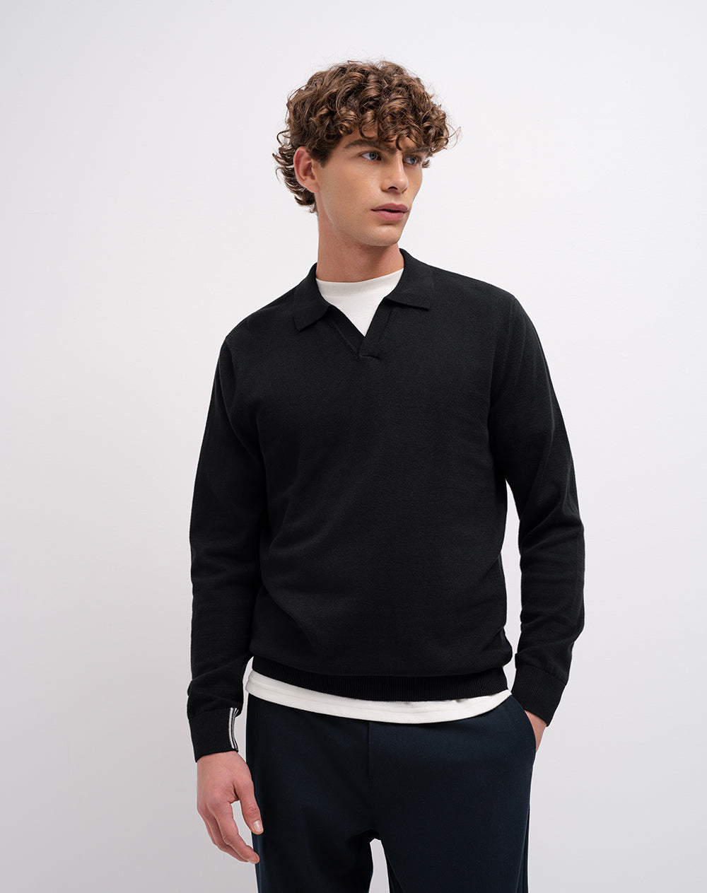 Buzo regular tejido de punto negro hombre