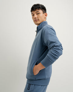 Buzo algodón sostenible cuello alto azul para hombre