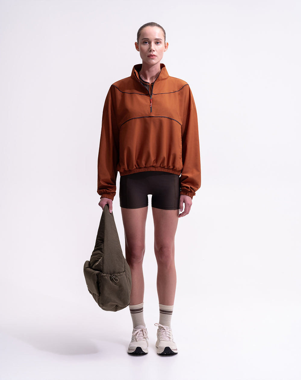 Chaqueta rompevientos terracota mujer