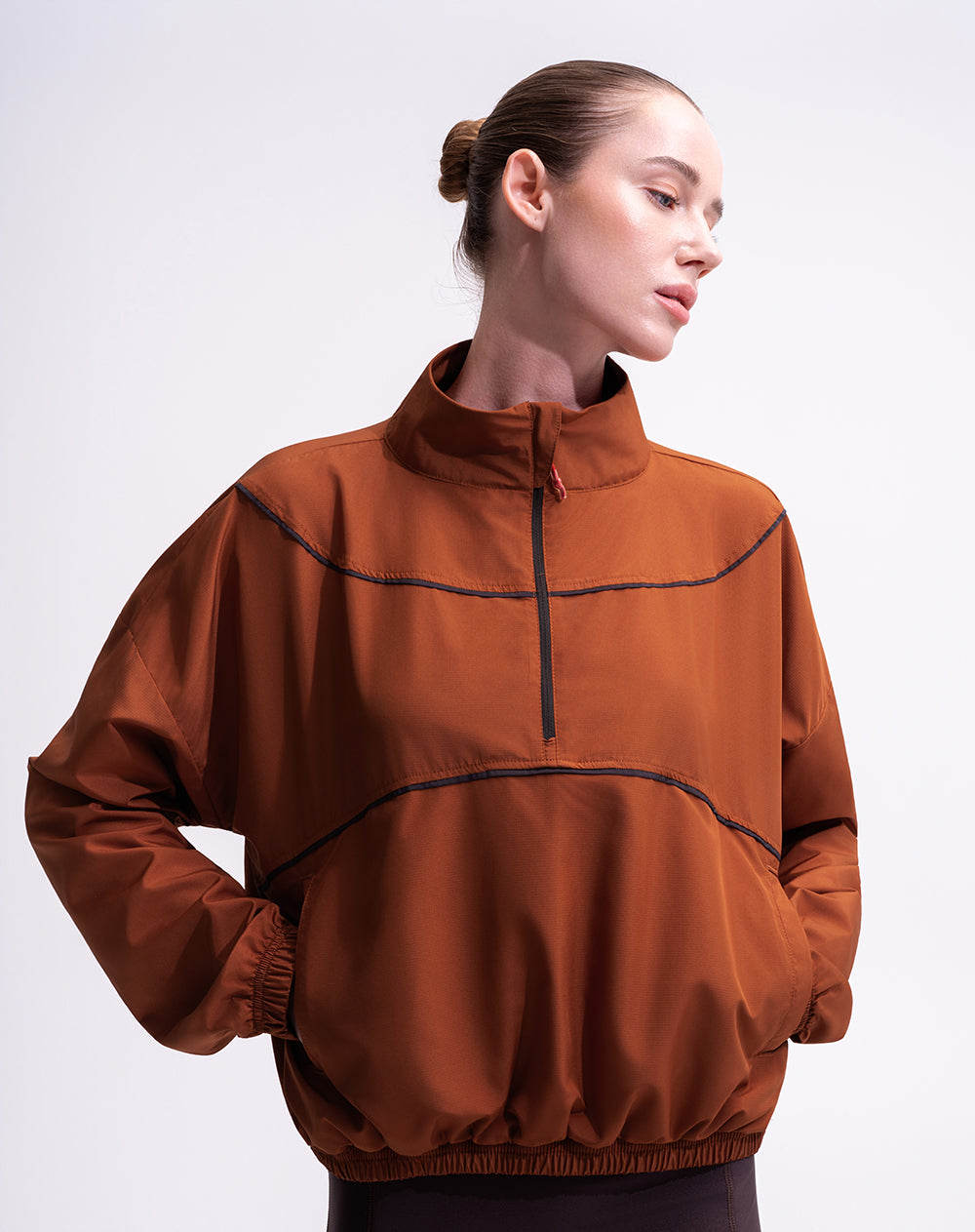 Chaqueta rompevientos terracota mujer