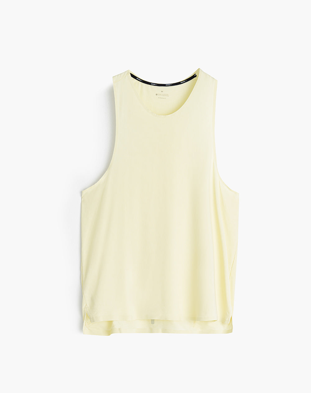 Camisilla deportiva hombre control humedad amarilla
