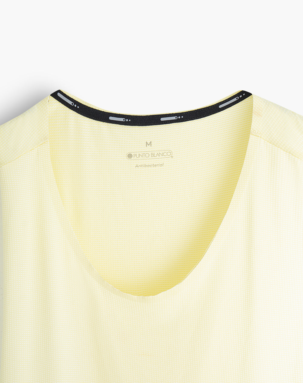 Camisilla deportiva hombre control humedad amarilla