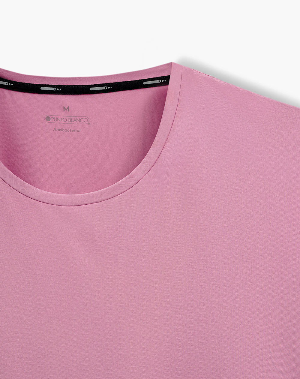 Camiseta deportiva control humedad rosada mujer