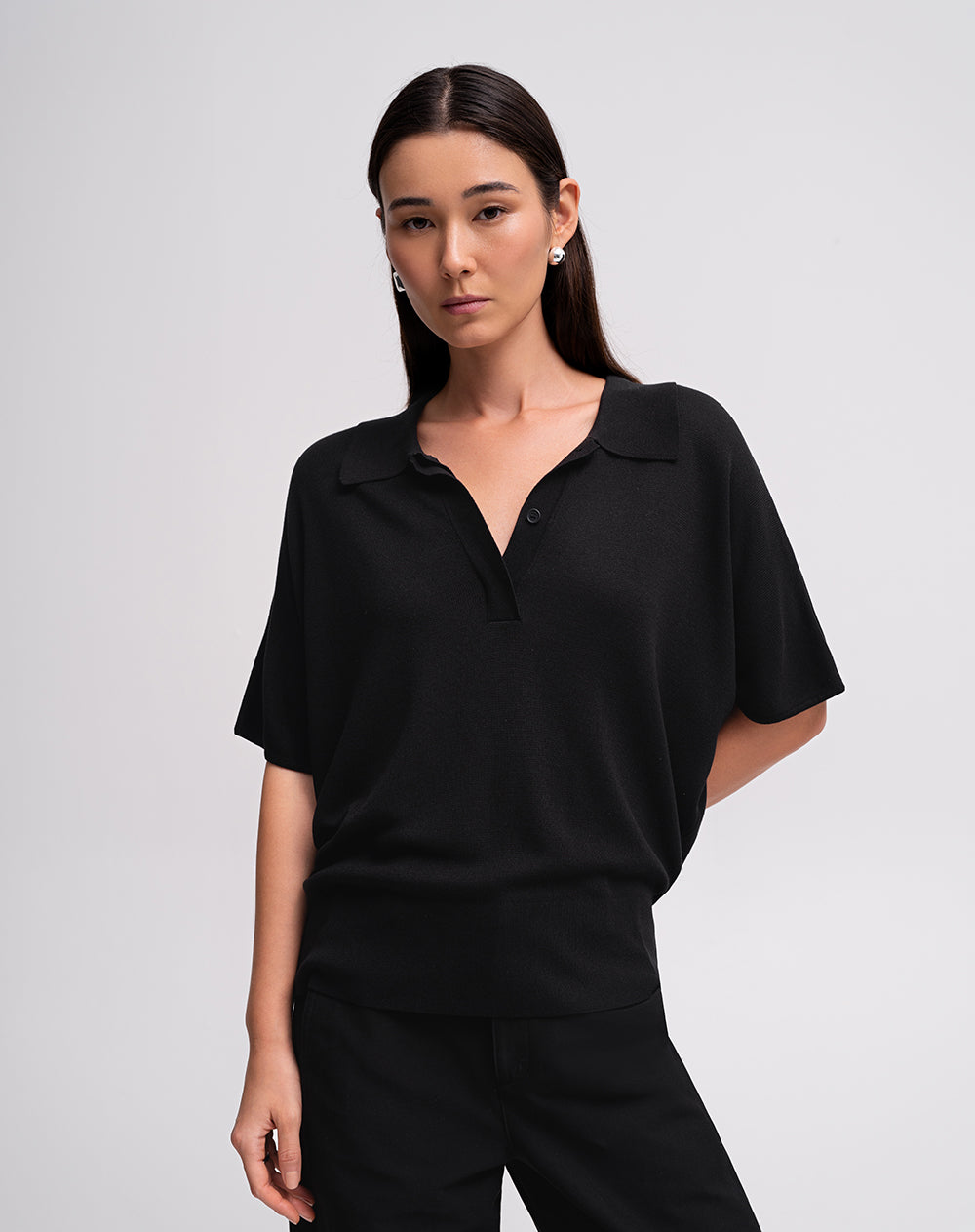 Polo regular tejido de punto negra mujer