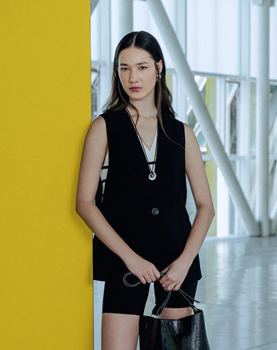 Chaleco tipo sastre oversize negro mujer