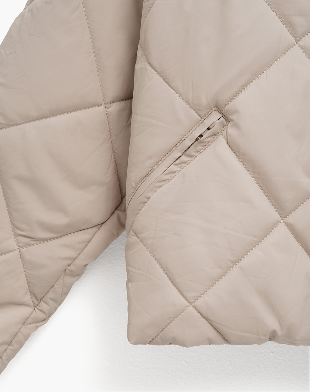 Chaqueta acolchada cuello alto avena mujer
