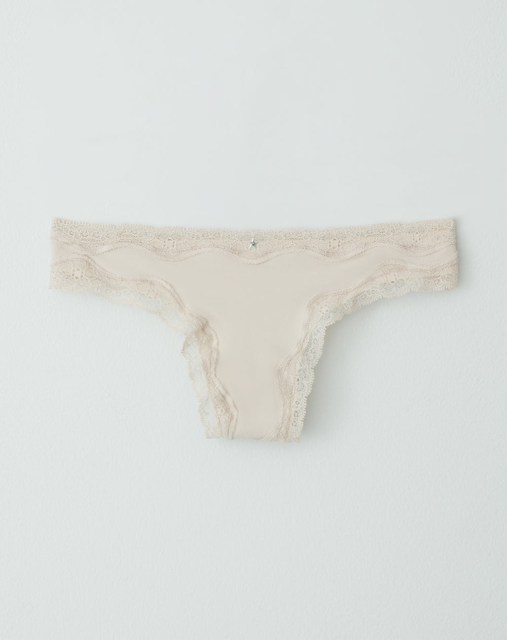 Panty tipo tanga microfibra encaje en cintura y pierna arena