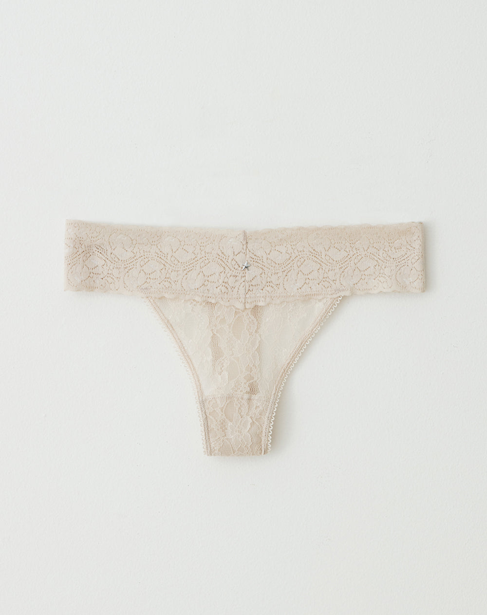 Panty tipo tanga microfibra elástico en encaje arena