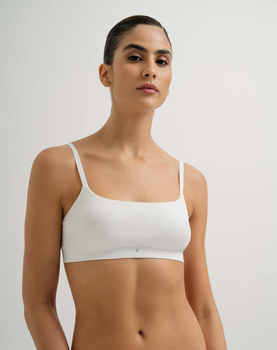 Top soporte medio pocas costuras y cargaderas graduables blanco