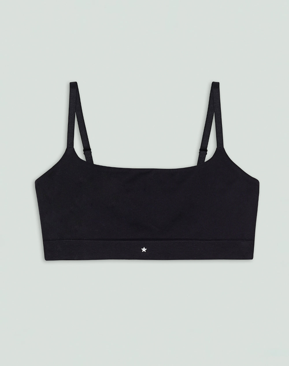 Top soporte medio pocas costuras y cargaderas graduables negro