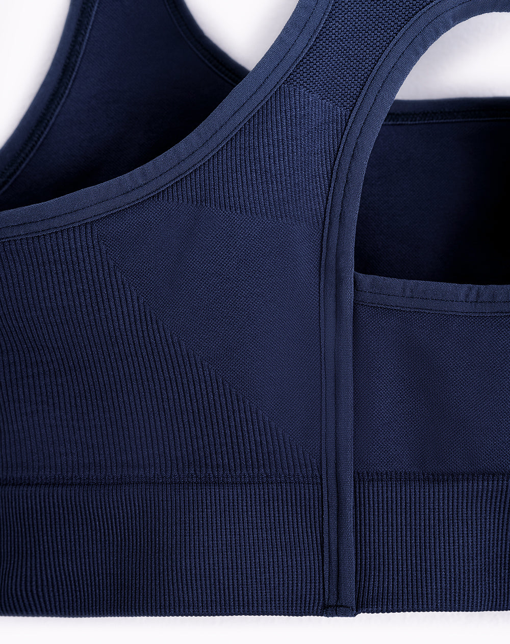 Top deportivo soporte alto control humedad azul