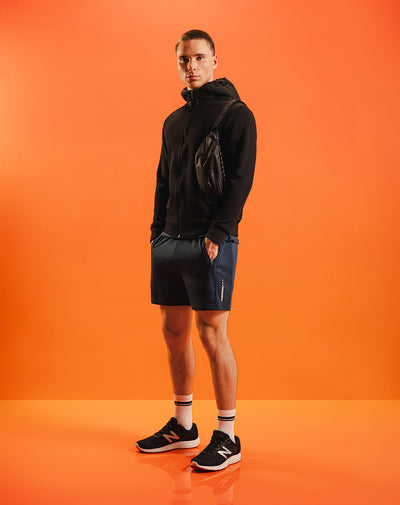 Pantaloneta deportiva control humedad azul hombre