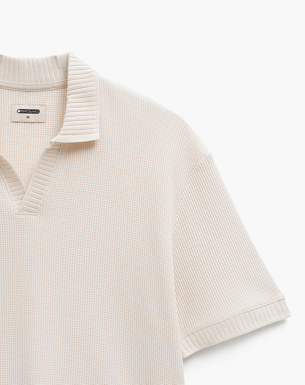 Polo regular tejida avena hombre