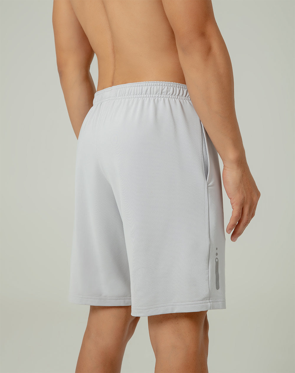 Pantaloneta deportiva control humedad gris para hombre