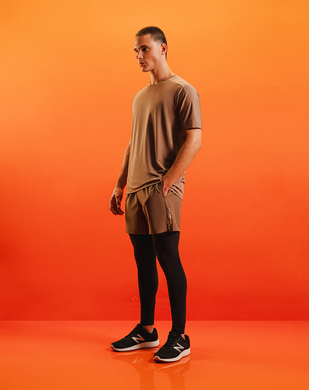 Pantaloneta deportiva malla interna café hombre