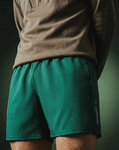 Pantaloneta deportiva malla interna verde hombre