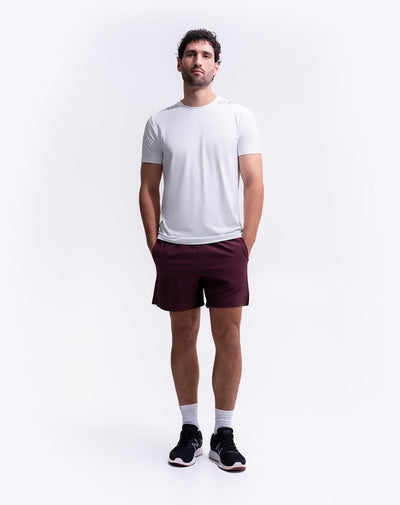 Pantaloneta deportiva malla interna vino tinto hombre