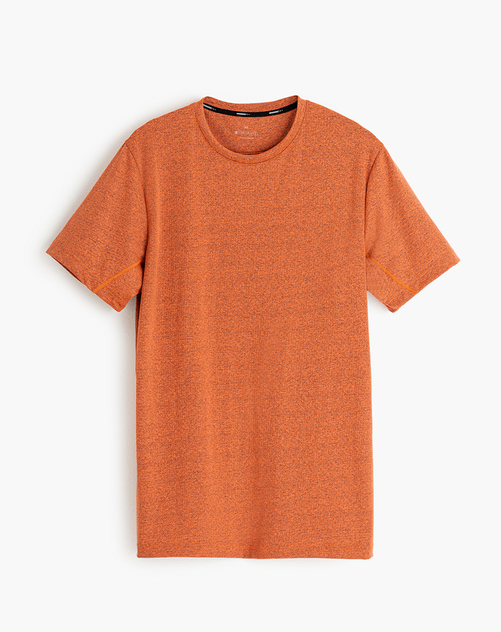 Camiseta deportiva hombre control humedad naranja