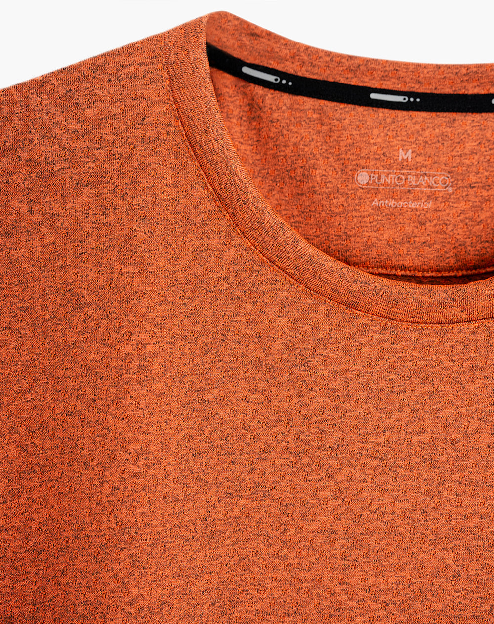 Camiseta deportiva hombre control humedad naranja