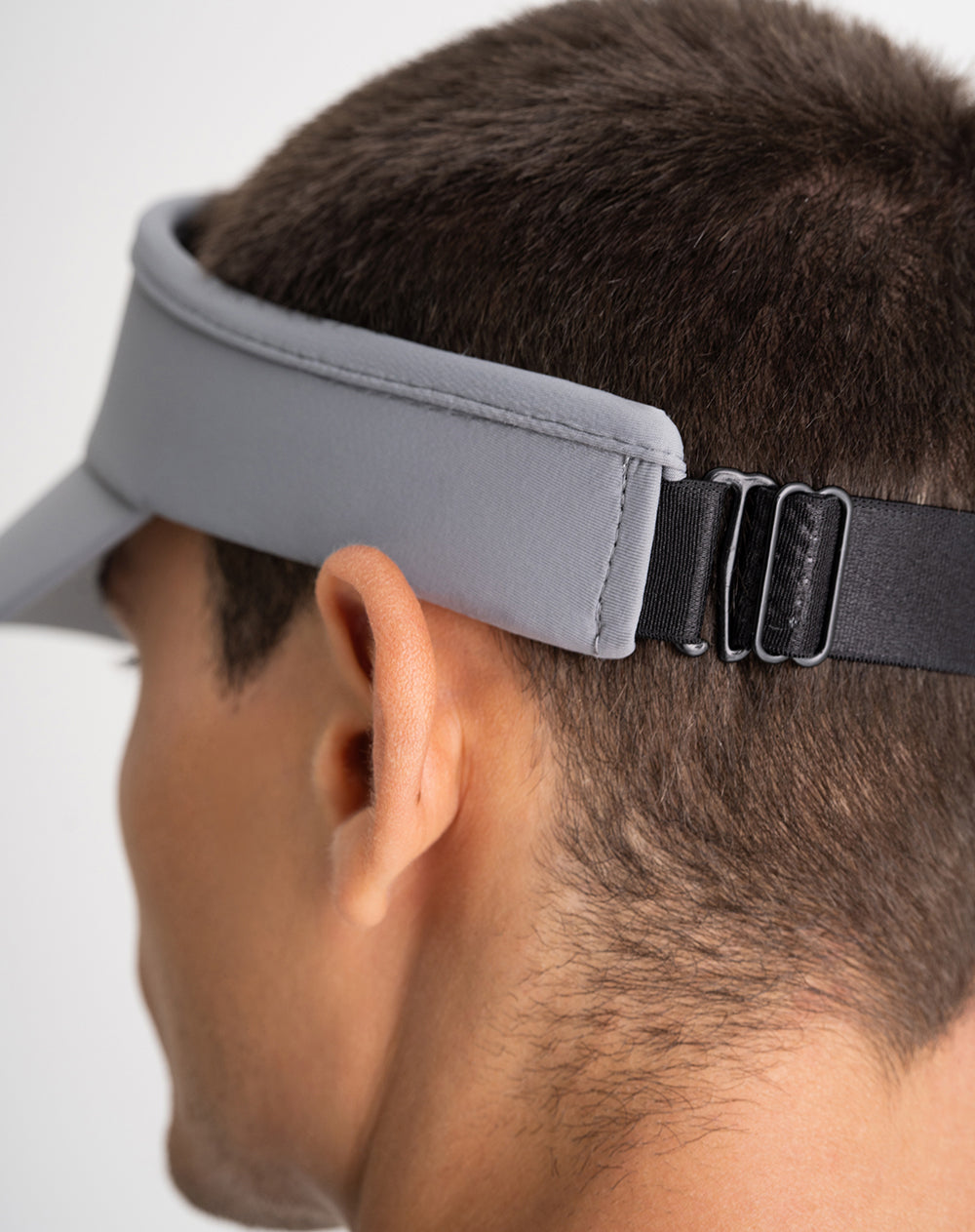 Visera deportiva gris unisex